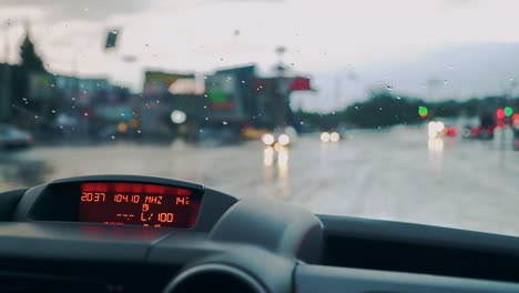 control panel in the car close-up. windscreen at the time of the rain.