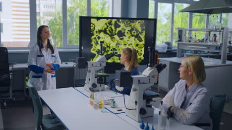 science students observing microscopic samples