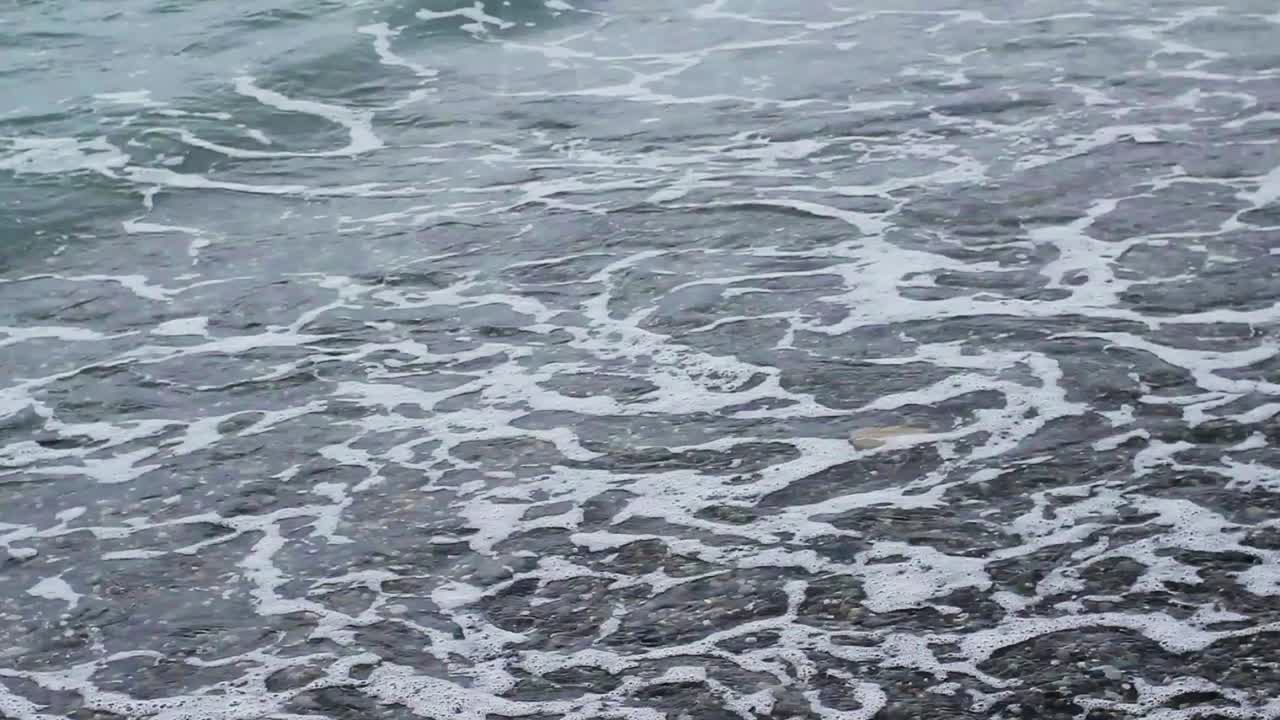 Bølger på stranden