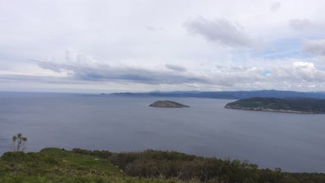 Walking-uphill,-panoramic-view-of-Estaca-de-Bares-in-Galicia-on-a-Cloudy-Day-with-sony-rx100-va-in-4k,-Cabo-Ortegal