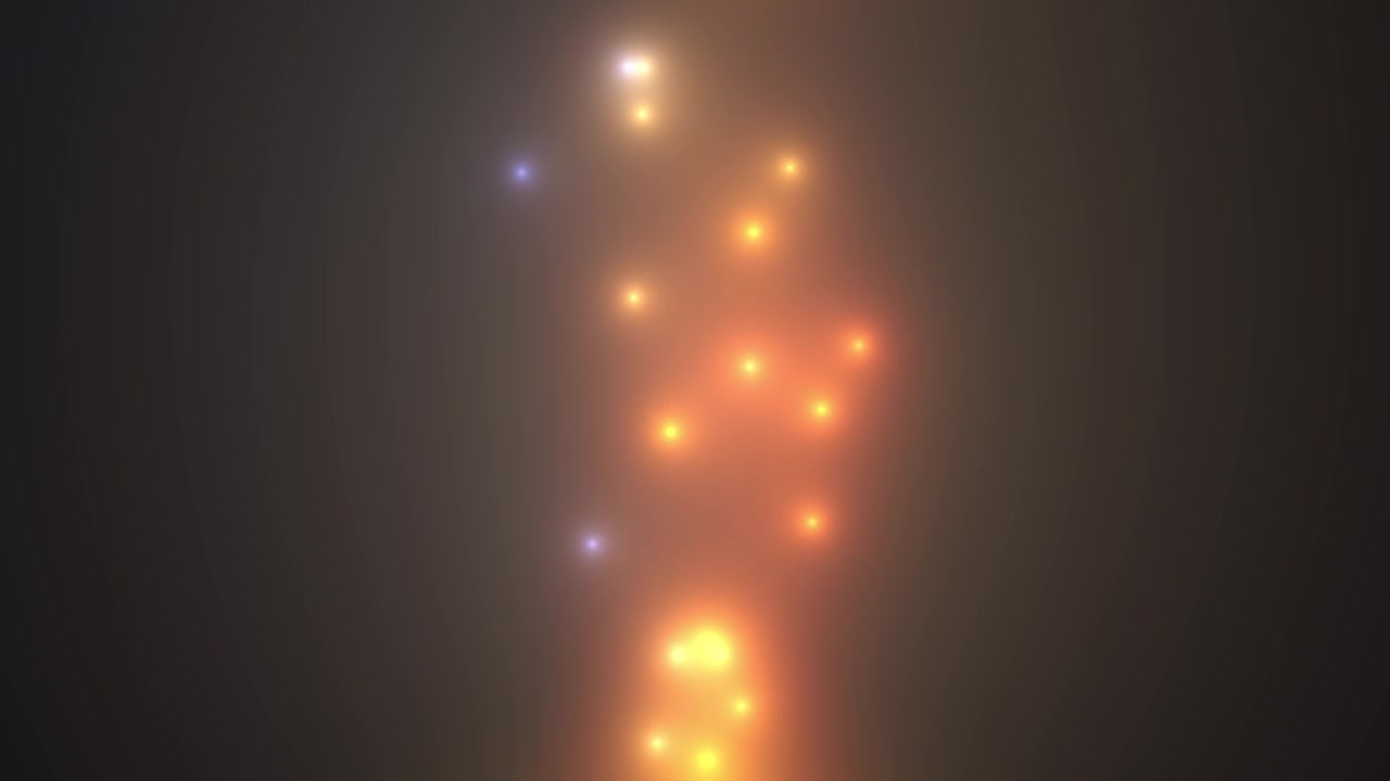 Etherische blauwe en oranje lichtdeeltjes bewegend in mist