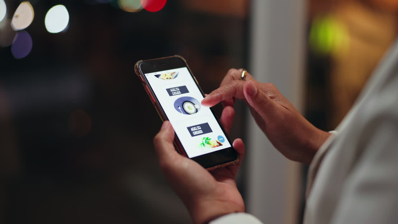 Woman using a mobile app for food delivery