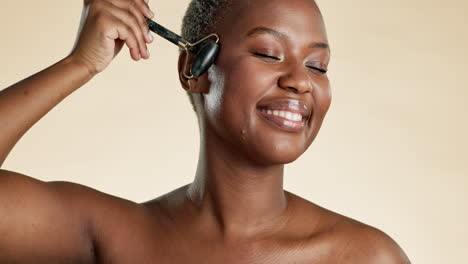 skincare, black woman and face roller