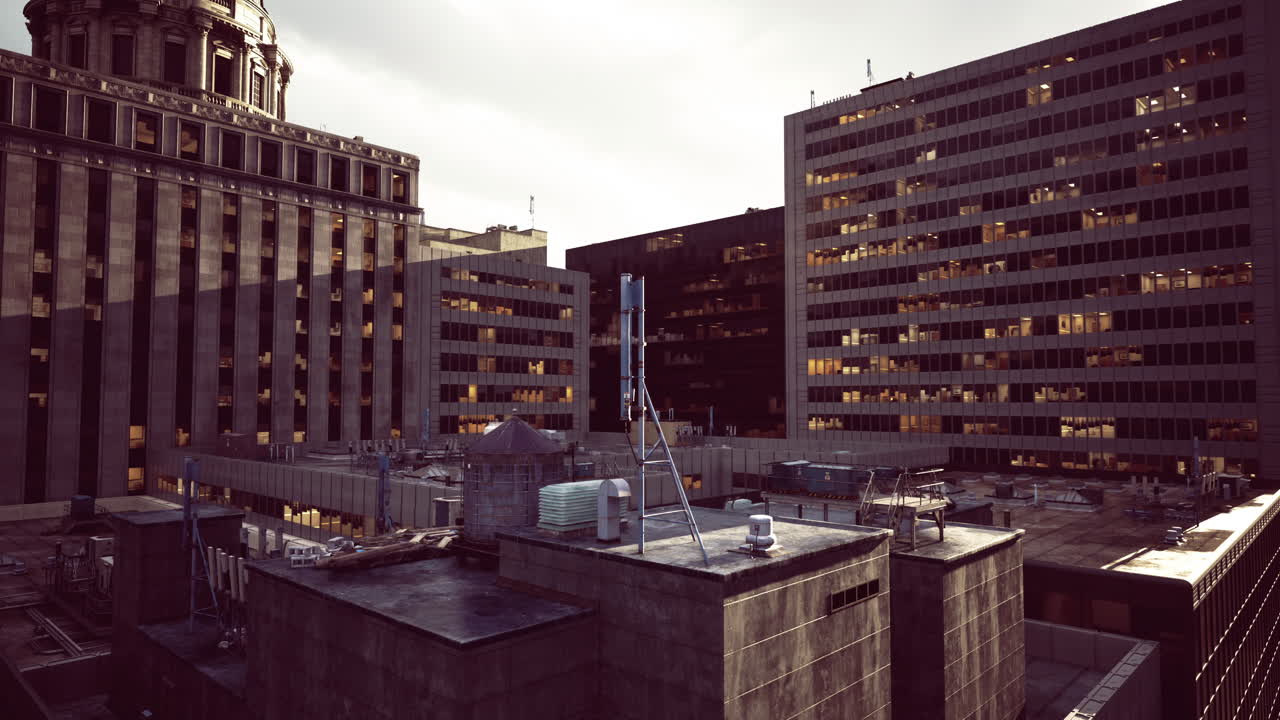 City skyline at dusk showcasing rooftop structures and lighting