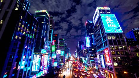 vibrant night cityscape with busy street traffic and neon lights