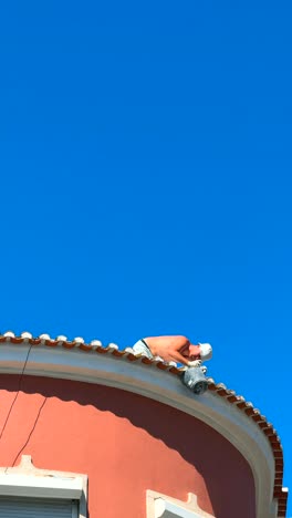 worker on a roof