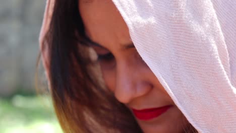 Beautiful-Indian-woman-smiling-and-looking-at-the-camera