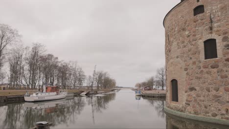 reflections on the lake in vadstena castle in ostergötland county, sweden