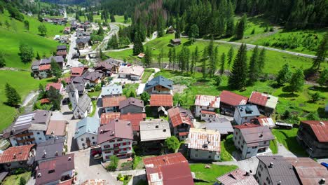 flyover aerial of sottoguda, most beautiful village in italy