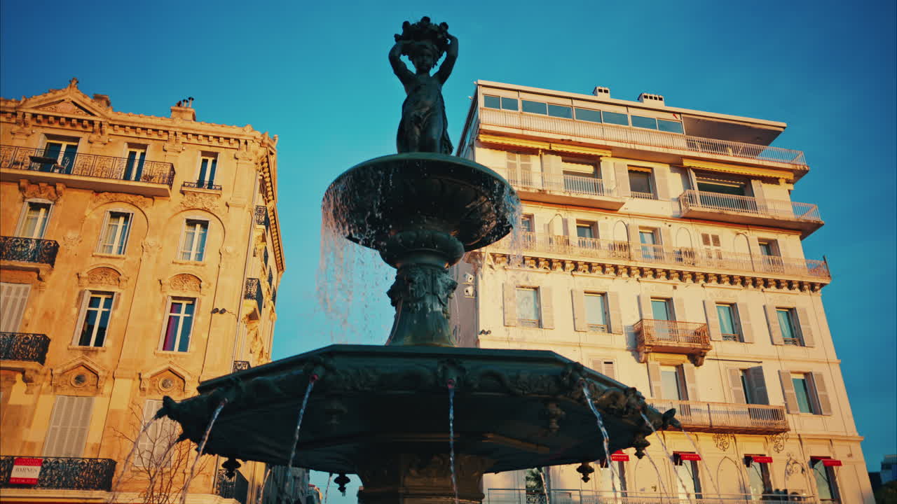 Cannes, France - December 14, 2024: Water fountain at the Place Charles de Gaulle at sunset