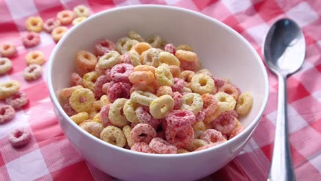 close up of colorful ring corn flakes in a bowl