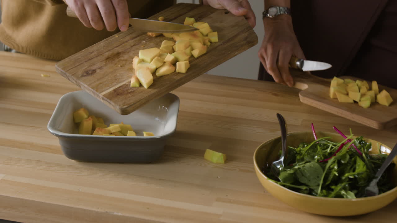 Preparing salad in the kitchen