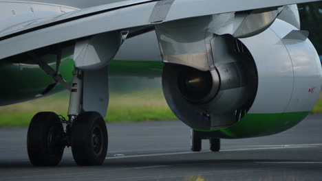 close-up behind view of an aircraft engine, highlighting the complex design and engineering features