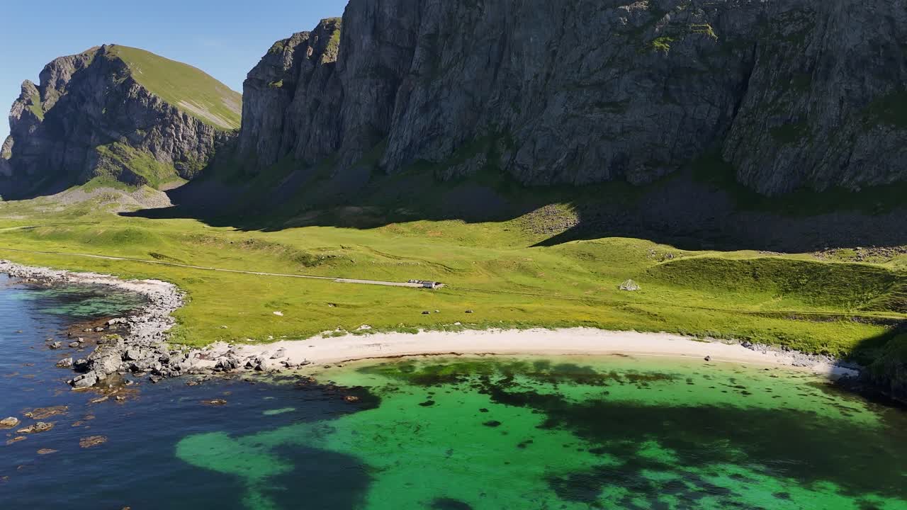 Værøy island in Lofoten, a wonderful wild white sand beach, surrounded by steep mountains