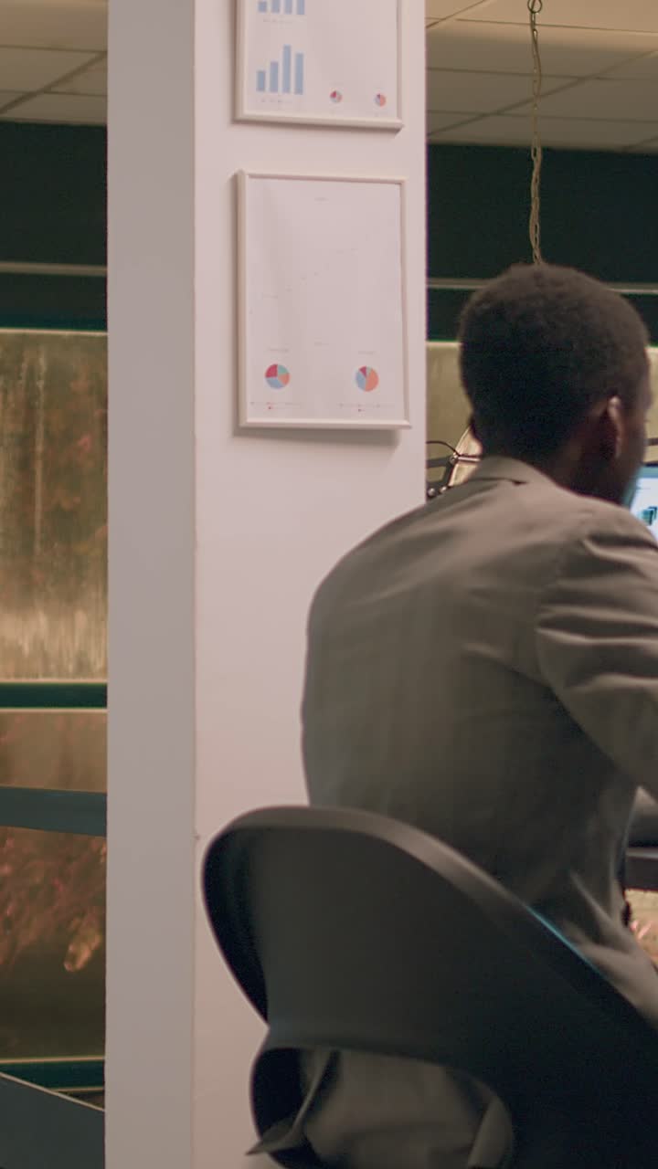 Vertical video Worker bidding farewell to colleague