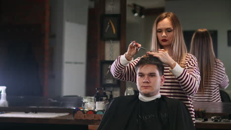 client visiting hairstylist in barber shop