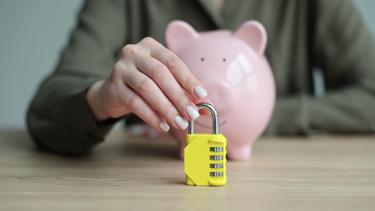 Securing Savings with a Piggy Bank and Padlock