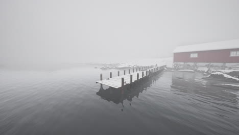 snowcovered dock in the cold norwegian sea