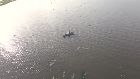 360-Aerial-Drone-Shot-of-LocalTraditional-Fishermen-in-Muddy-River-Fishing