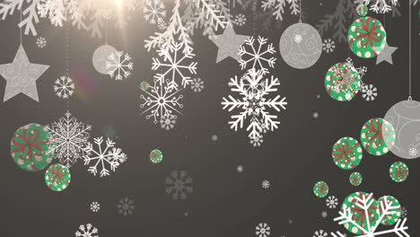 Digital-animation-of-snowflakes-and-christmas-fits-falling-against-bright-spot-of-light