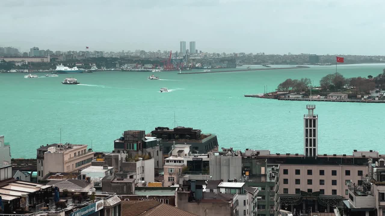 Establishing shot of galata tower in Istanbul Turkey, View of the Bosphorus.