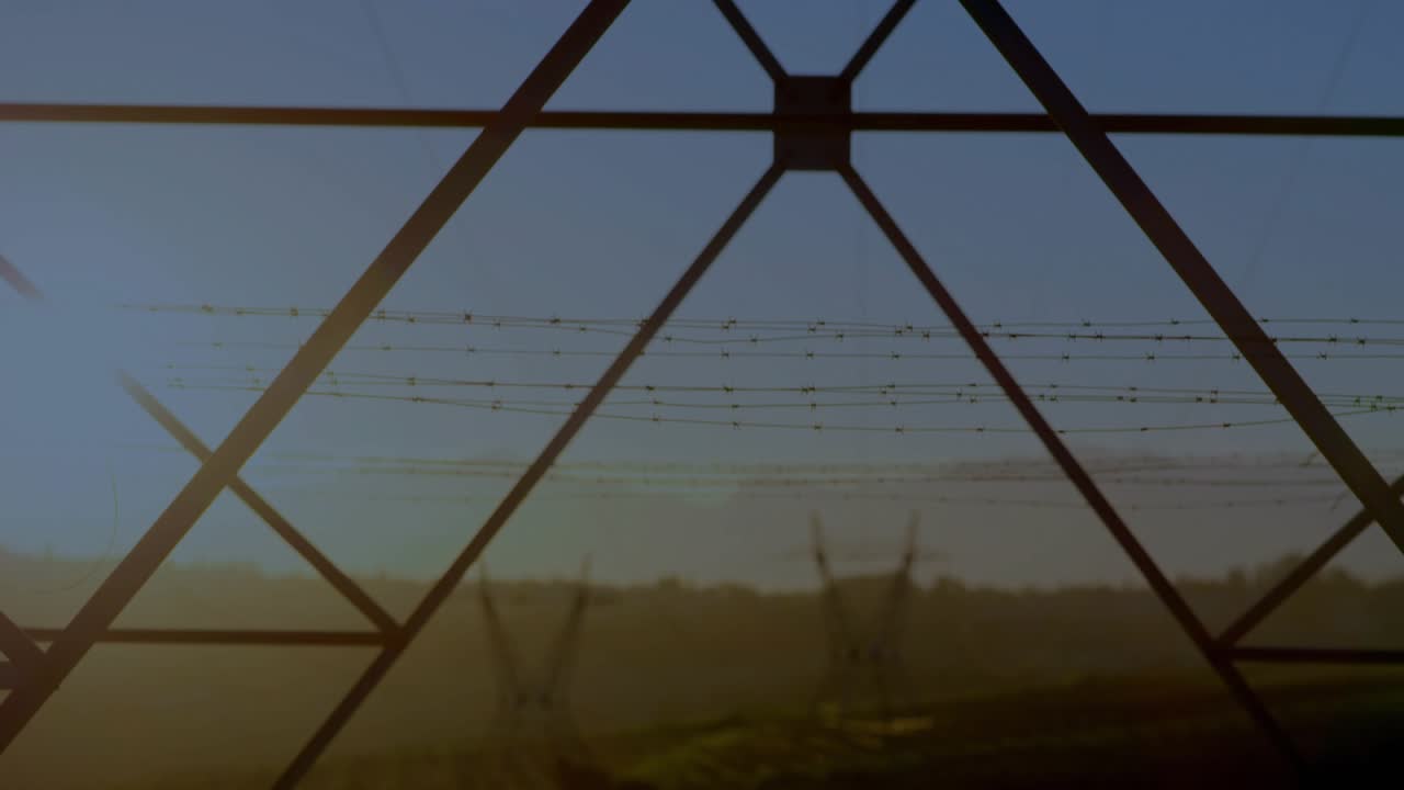 Steel lattice frame occupying mid, neon traces appearing left and graphs moving right, showing load