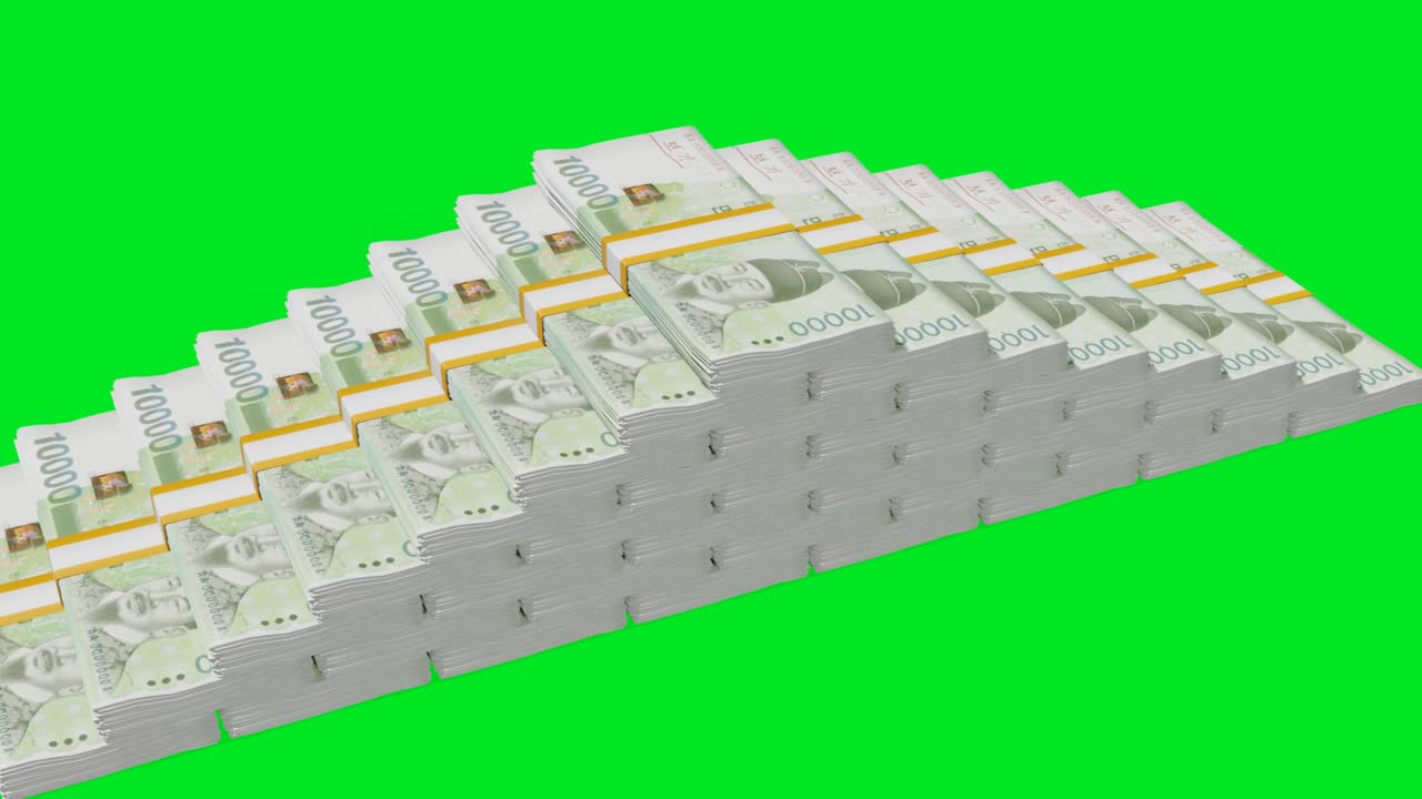 Many wads of money  on chromakey background. 10000 South Korean Won banknotes. Stacks of money.