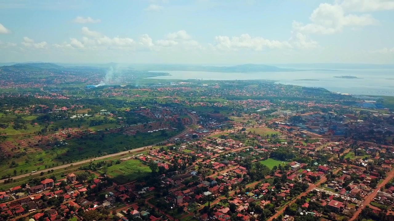 Jinja City Panoramic View On The North Shore of Lake Victoria In Uganda, East Africa. Aerial Shot