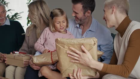 two man with daughter and family spending christmas together.