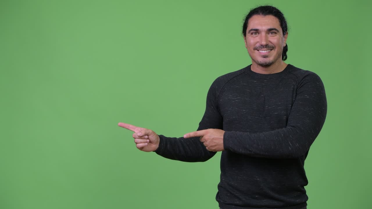 Handsome man showing something
