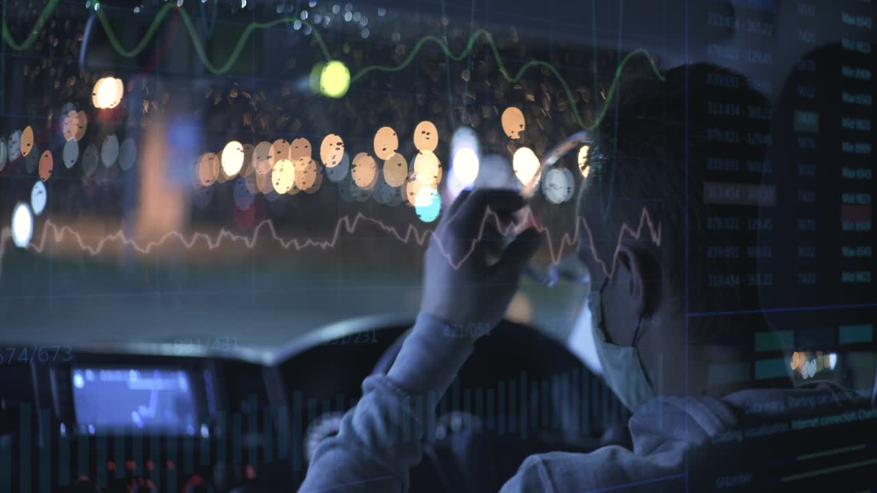 젊은이가 차에 앉아서 보호 마스크를 착용합니다.