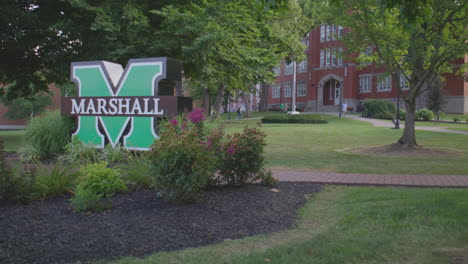 marshall university campus sign and building