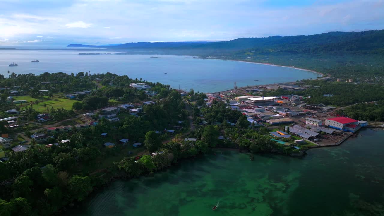 Sundaun Market Wewak Hill Seawall Meni Beach aerial drone Wewak East Sepik Region Province Papua New Guinea PNG summer morning sunrise dry season Dogreto Bay Boram road coastal town backwards pan up