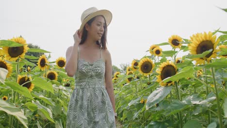 Lower-view-of-an-asian-woman-in-hat