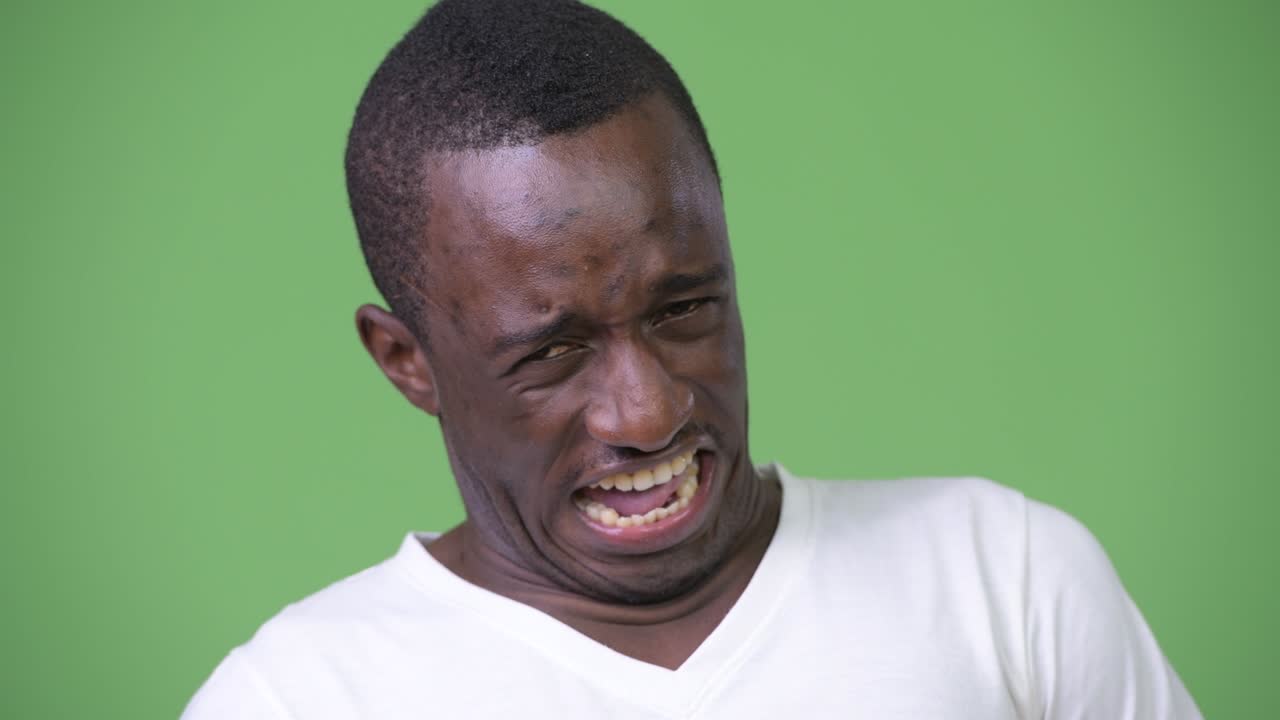 Young African man looking disgusted