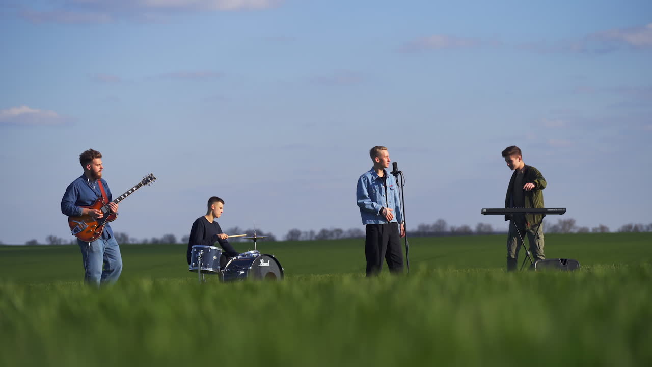 Band performing in a field