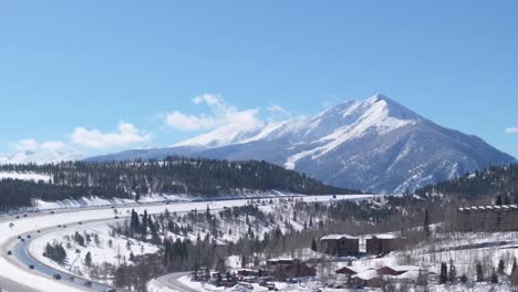 Winter-landscape-with-highway-and-forest