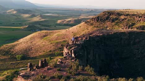 Young-couple-on-love-photoshoot-at-golden-hour-in-stunning-location