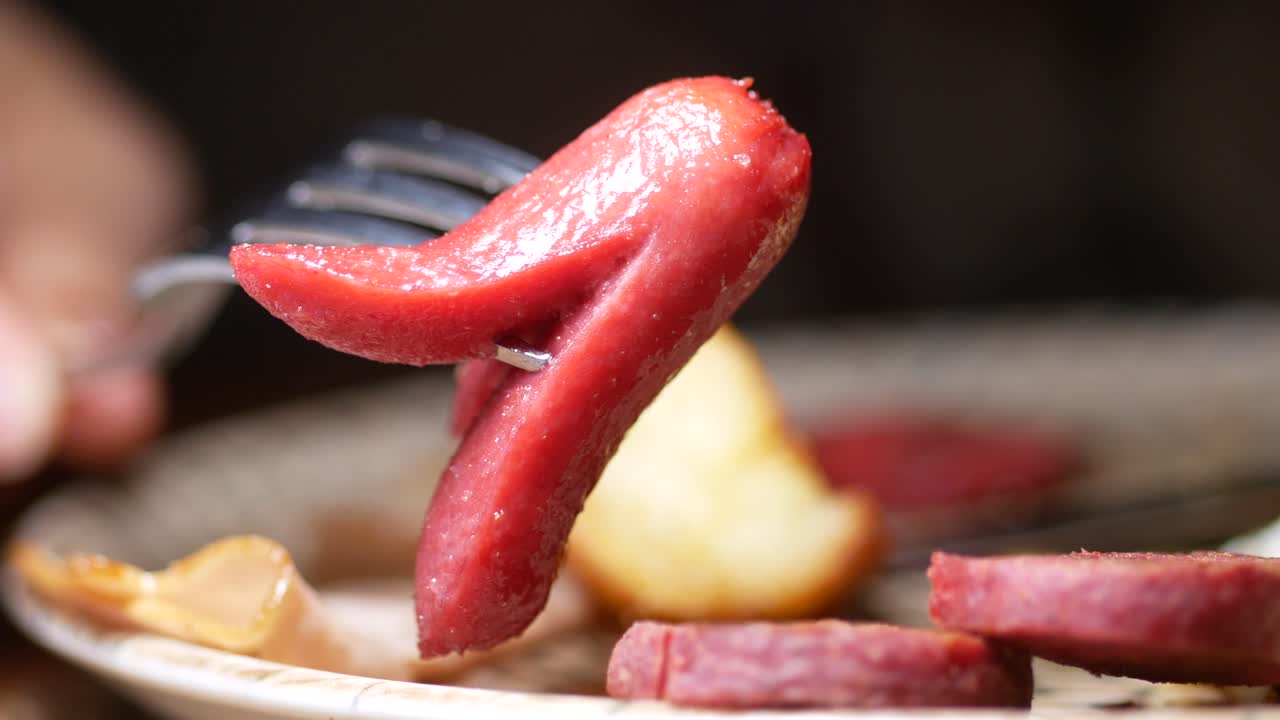 Delicious Hot Dog on Fork