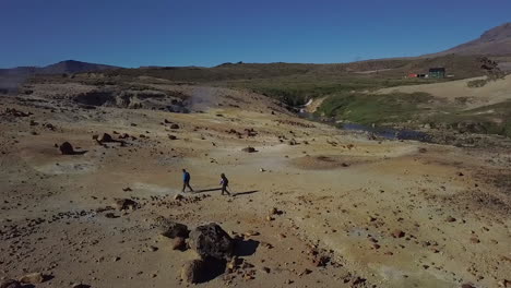 aerial - people hiking in caviahue, argentina patagonia, slow motion spinning shot