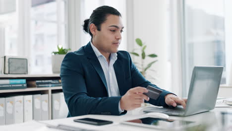 Man,-success-or-credit-card-at-laptop-in-office