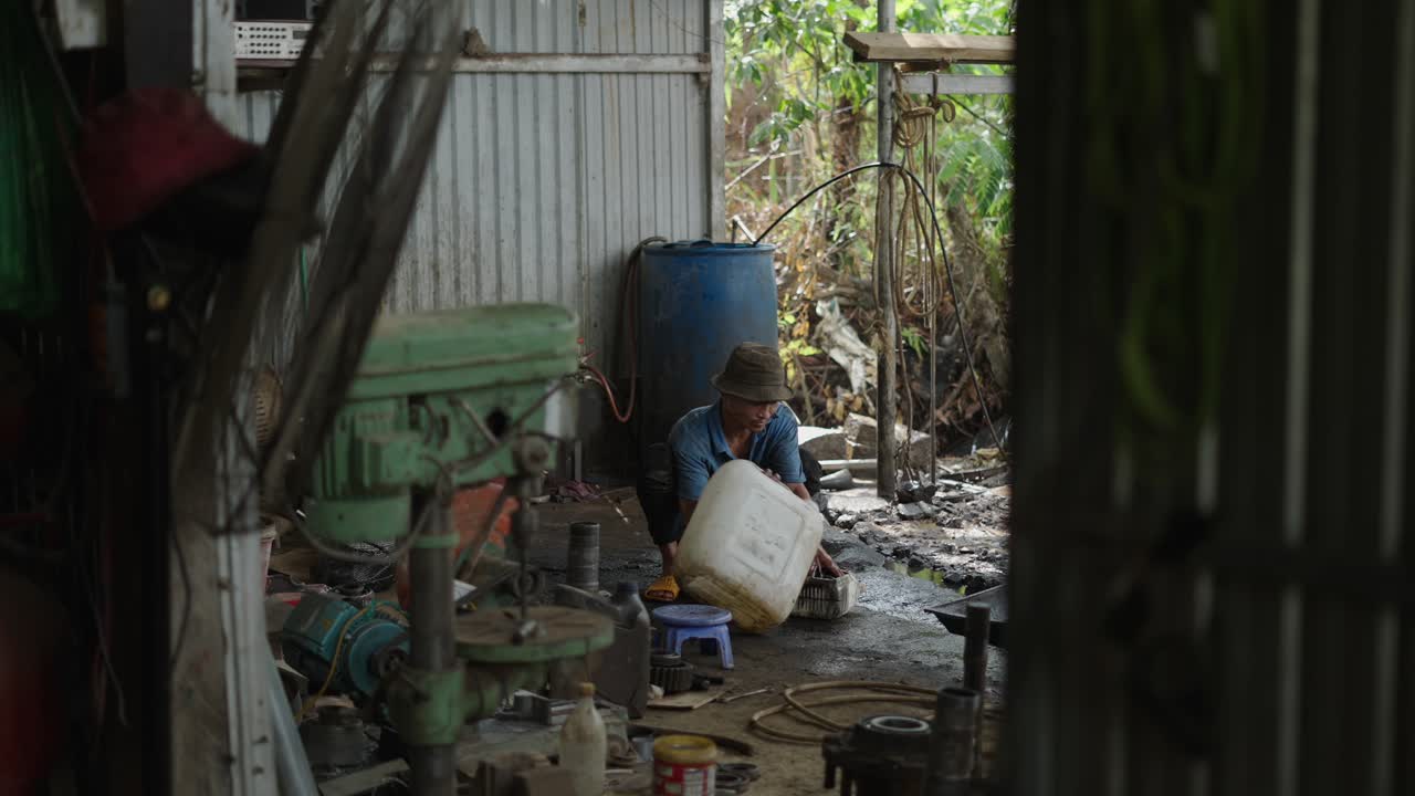 Worker in a Rural Workshop | Premium Stock Video Footage