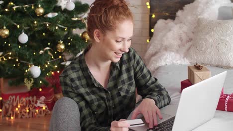 woman using laptop during online shopping