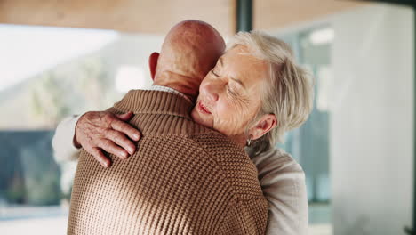 affectionate elderly couple embracing