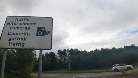 speed traffic camera sign panning to cars stopped