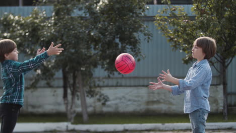 boy playing basketball outdoors