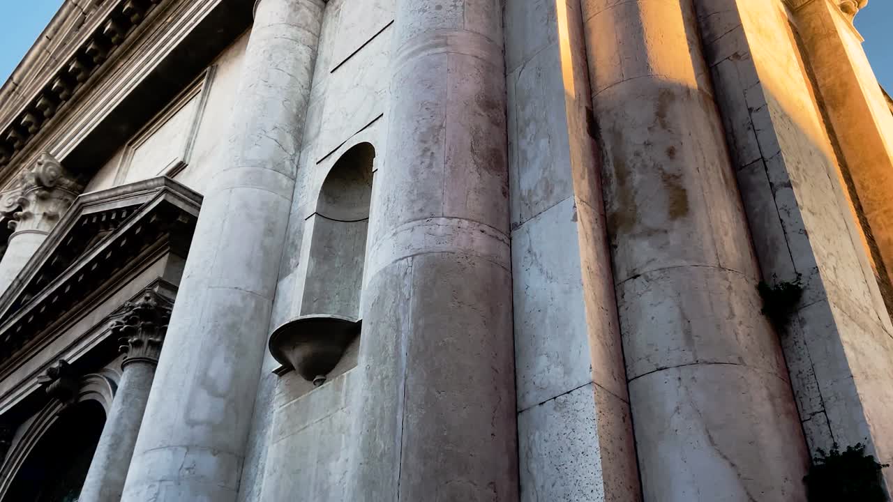 Details Of Exterior Columns Of San Pietro Di Castello Church In Venice, Italy - panning up shot