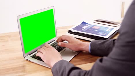 Businessman-using-laptop