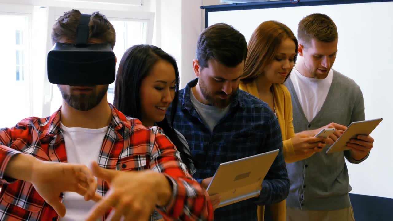 Business executives using digital tablet, mobile phone and virtual reality headsets
