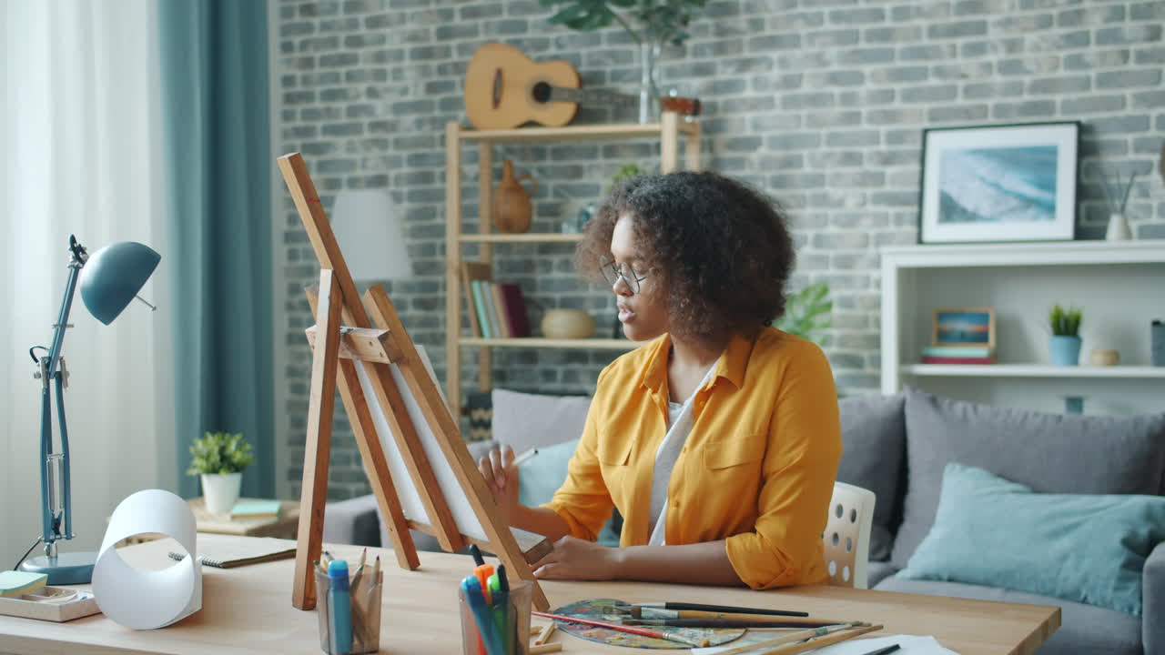 Woman painting at home